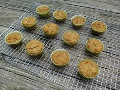 twelve cupcakes cooling on a wire rack, ready to go into the oven