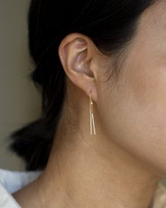 Mini 14k solid gold Threader earring.Simple, minimalist Earring Total length: 3" Available in 14K Yellow Gold, Rose gold or White Gold 1 Piece or 1 Pair Earring Simple, Threader Earrings Gold, Minimalist Earring, Threader Earrings, Minimalist Earrings, Gold Rose, Solid Gold, 1 Piece, Yellow Gold