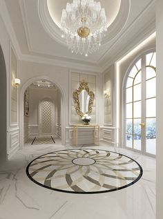 a large white room with chandelier, mirror and marble flooring in it