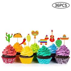 cupcakes with colorful frosting and decorations are arranged in a row on top of each other