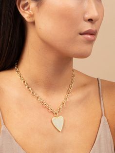 Our Big Love Necklace features a large heart pendant on a classic rolo chain. This statement necklace is the perfect example of why you need necklace pendants in your jewelry collection. | Gold Big Love Heart Pendant Necklace on Rolo Chain | Women's Jewelry by Uncommon James Heart Shaped Charm Necklace With Chunky Chain, Heart Pendant Necklace With Chunky Chain, Heart Shaped Chunky Chain Necklace, Heart-shaped Cable Chain Jewelry, Uncommon James, Large Heart, Necklace Pendants, Rolo Chain, Big Love