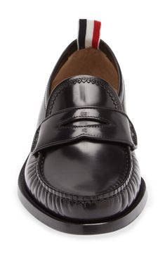 Supple calfskin leather throughout ensures comfort and flexibility as it also elevates this handsome Italian loafer with a bit of branding on the heel loop. Leather upper, lining and sole Made in Italy Designer Shoes Designer Brogue Loafers For Business Casual, Modern Wingtip Calf Leather Loafers, Bridle Leather Plain Toe Loafers For Work, Formal Bridle Leather Loafers With Rubber Sole, Designer Goodyear Welted Loafers For Workwear, Office Calf Leather Loafers With Moc Toe, Office Calf Leather Moc Toe Loafers, Calf Leather Moc Toe Tassel Loafers For Office, Bridle Leather Loafers With Rubber Sole For Work