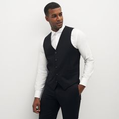 Complete your 3 piece look with our classic black TGS vest. So versatile, pair it with our Classic Black Suit or Tuxedo for a polished look! Black Vest Men, Black Suit For Men, Men's Black Suit, Groomsmen Vest, Classic Black Suit, Vest Outfits Men, Male References, Waistcoat Outfit, Black Suit Vest