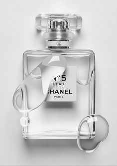 a bottle of chanel no 5 eau de parfum on a white background