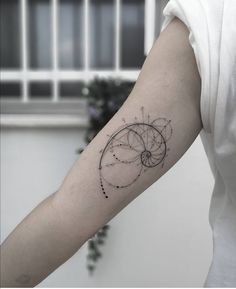 a person with a tattoo on their arm