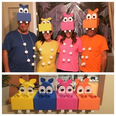 four people in costumes made to look like cartoon characters