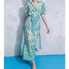 The Perfect Summer Dress! Button Front, Slits On The Side, Blue Green And Yellow Spring Green Paisley Print Midi Dress, Spring Blue Maxi Dress With Button Closure, Spring Green Paisley Midi Dress, Blue Maxi Dress With Button Closure For Spring, Buttoned Maxi Dress For Garden Party, Bohemian Blue Dress With Button Closure, Short Sleeve Maxi Dress With Paisley Print For Summer, Blue Bohemian Maxi Dress With Buttons, Fitted Blue Midi Dress With Paisley Print