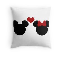 two mickey mouse heads with red hearts on white pillow cover, both have black ears and are facing each other in the same direction