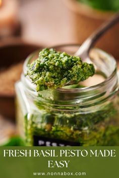 fresh basil pesto made easy in a glass jar with a spoon on the side