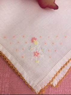 This very sweet delicate linen vintage handkerchief is in very nice condition and is from the 60's. The trim is gold color crocheted lace and has embroidered pastel flowers. Very delicate looking. Condition Statement: All of my items are in good shape, and they come from a very clean, smoke free home. They are washed and freshly pressed before shipping, because I specialize in vintage and vintage-inspired classic items, they are used unless otherwise marked (NWT). Return Policy: I do not except returns unless there was a mistake with the description or size. Cheap White Retro Handkerchiefs, Vintage Handkerchiefs With Embroidered Border As Gift, Vintage Handkerchief With Embroidered Border As Gift, Vintage Handkerchiefs With Machine Embroidery As Gift, Bride Decor, Embroidered Handkerchief Wedding, Handkerchief Wedding, Wedding Hankies, Chino Hills