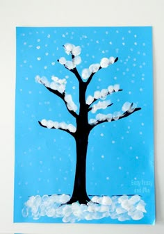 a painting of a tree with snow on it