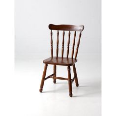 an old wooden chair on a white background with room for the word's logo