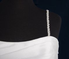 Beaded Pearl and Crystal Bridal Gown Straps These sparkling beaded straps are 20" long and can be sewn onto your wedding dress to add a beautiful as well as functional element to your bridal ensemble. Glistening crystals, baby pearls and rocaille beads combine for this elegant addition to your dress. Size: Each strap is about 20" long. 2 Straps are included. Color: Ivory. Style: 9657. Please allow about 1 week for delivery. Shipping Policy . Return Policy. Straps For Wedding Dress, Beaded Edge Veil, Quinceanera Accessories, Winter Wedding Accessories, Gatsby Style Wedding, Beaded Wedding Veils, Fingertip Wedding Veils, Rose Gold Bridesmaid, Veil Accessories