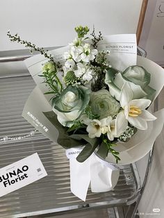 a bouquet of flowers sitting on top of a table