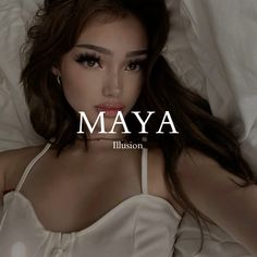 a woman laying in bed with her eyes closed and the words maya on it