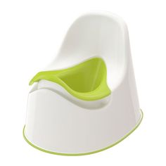 a white and green potty sitting on top of a table