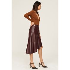 Brown faux leather (100% Polyurethane). Lining (100% Polyester). A-line. Side zipper closure. 28.5" from waist to hemline. Imported. Fall Faux Leather Skirt With Zipper Closure, Chic Zipper Closure Skirt For Fall, Chic Fall Skirt With Zipper Closure, Fall Party Skirt With Zipper Closure, Chic Faux Leather Skirt With Zipper Closure, Fall Faux Leather Skirt With Side Zipper, Chic Office Skirt With Zipper Closure, Elegant Fall Skirt With Zipper Closure, Fall Workwear Skirt With Side Zipper