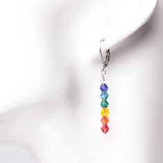 Chakra Rainbow bead earrings A beautiful rainbow of faceted glass beads in chakra colours. Approximately 4.5cms long including the stainless steel lever back ear fittings. In stock and ready to ship Stainless steel fittings are less likely to cause problems for metal allergy sufferers. Chakra Colours, Bead Dangle Earrings, Chakra Colors, Boho Jewellery, Rainbow Beads, Bird Earrings, Rainbow Earrings, Bird Jewelry, Earrings Cute