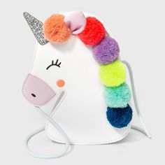 When your little girl steps out with her squad, she can carry her essentials in style with the Kids' Pom Pom Unicorn Crossbody Purse from Cat and Jack™ in White. She can easily toss a chapstick, sunglasses, hand sanitizer, keys, and other accessories. This versatile bag is easy to pair with her outfits. This crossbody bag comes with a single shoulder strap making super handy for her as she takes on the day. Gender: unisex. Playful Unicorn Print Bag For Everyday Use, Cute Unicorn Print Bags For Everyday, Cheap Playful Unicorn Print Bags, Playful Unicorn Print Bags, Playful Multicolor Unicorn Print Bag, Unicorn Backpack, Unicorn Bag, Cat And Jack, Kids' Bag