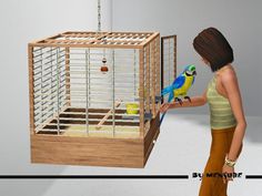 a woman standing next to a bird in a cage