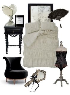 black and white bedroom decor with feathers on the bed, chair, lamp, mirror