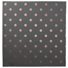 a gray and pink polka dot pattern napkin