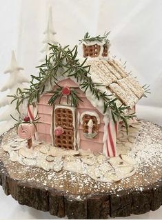 a gingerbread house is decorated with candy canes