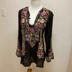 Johnny Was “Fabio” Tunic Embroidered Black Excellent Condition Small Black V-neck Blouse With Floral Embroidery, Fitted Black Embroidered Top For Festival, Black Long Sleeve Embroidered Top, Black Embroidered Top For Spring, Black Embroidered Long Sleeve Top For Summer, Black Long Sleeve Embroidered Top For Summer, Black Top With Intricate Embroidery, Fall Black Top With Floral Embroidery, Black Fitted Bohemian Embroidered Top