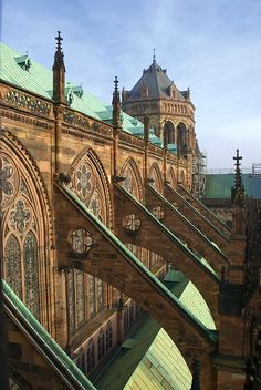 an old building with many windows and spires