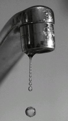 a faucet with water dripping from it