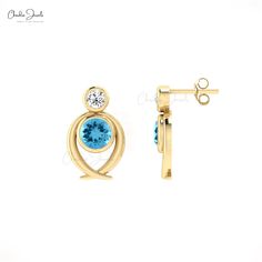 Description Dazzle with these 14k real gold studs featuring 5mm Swiss Blue Topaz and round-cut diamonds. Perfect for December birthdays or adding a pop of color to any outfit. These two-stone earrings combine classic elegance with modern charm, making them ideal for everyday wear or special occasions. Product Details SKU CJ E 1442 SW Metal 14K solid gold Closing mechanism Push Back Product dimension 15.65mm x 9.80mm x 2.40mm Birthstone December Certification - Swiss Blue Topaz Details Size 5mm Q Blue 14k Gold Jewelry With Tension Setting, Topaz Yellow, Blue Topaz Earrings, Topaz Earrings, Swiss Blue Topaz, Sparkle Diamonds, Bezel Setting, Blue Topaz, Topaz