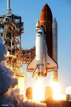 an image of a space shuttle taking off