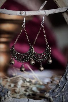 Moody witch's bells earrings. These earrings are made with real bells that have a light, musical sound. These earrings are lightweight and can be work by anyone with pierced or stretched ears. The earrings are approximately 2 inches long. These earrings are perfect for any renaissance faires, cosplay, witchcraft attire, Halloween parties, pagan festivals and more. Witch's Bells, Halloween Antiques, Pagan Festivals, Earrings Halloween, Witch Jewelry, Stretched Ears, Halloween Parties, Fete Halloween, Halloween Shopping