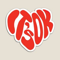 red sticker with the word love written in it's center, and an image of