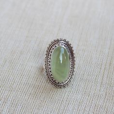 Gemstone - Natural Prehnite Metal - Sterling Silver Ring size - All sizes available Each Ring made with Precision and love, these rings are perfect for everyday use and a perfect accessory to wear at work. Rings can be customized on request and gemstone can be switched to any other as per requirement. kindly visit my store to view the complete collection. Feel free to contact me for any queries regarding jewelry or for bulk order. The ring will be gift wrapped in a premium handmade jewelry box Silver Peridot Jewelry As Gift, Green Crystal Gemstone Ring For Spiritual Wear, Silver Peridot Jewelry For Anniversary, Green Spiritual Jewelry For Anniversary, Sterling Silver Large Stone Jewelry For May Birthstone, Sterling Silver Jewelry With Large May Birthstone, Silver Gemstones For May Birthstone Gift, Sterling Silver Jewelry With May Birthstone, Silver May Birthstone Gemstones For Gifts