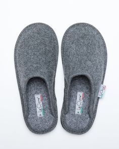 Description: The Le Clare women's Stella in grey is the classic "hotel slipper" reimagined in luxurious boiled wool. This quintessential slipper provides delicate comfort and has been handcrafted, only for the most discerning, the Stella will not disappoint. Featuring our premium Italian boiled wool fiber, the slipper gently conforms to your foot for cozy comfort. The natural elasticity of our wool bounces back to its original shape, giving the slipper lasting appeal with a customized fit. This Wool Round Toe Indoor Slippers, Winter Wool Slip-on Slippers, Cushioned Wool Slip-on Slippers, Felt Wool Slipper, Wool Indoor Slip-on Slippers, Classic Hotel, Natural Contour, Wool Slippers, Boiled Wool