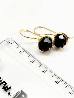 The studs are simple and suitable for all outfit styles. These black earrings are also a great gift for Her. Simple, elegant, minimalist and chick = perfect gift. Delicate pearl earrings, wired with gold fill wire and silver filled. It's minimalist style make in detail unique. Beautiful Round Crystal Earrings in half embroidery make an excellent finish in these classic earrings. For these beautiful earrings you can choose to make us in any of our wrapped wire: rose gold, silver or gold the one y Minimalist Black Earrings For Everyday, Minimalist Black Single Earring, Black Minimalist Everyday Earrings, Black Drop Earrings With French Hook, Nickel-free Black Round Earrings, Adjustable Minimalist Earrings For Party, Trendy Black Nickel-free Earrings, Nickel-free Black Everyday Jewelry, Black Hypoallergenic Round Earrings