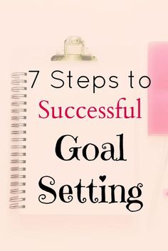 a notepad with the words 7 steps to successful goal setting