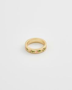 An elegant gold band graced with hand-painted enamel pink flowers, creates a delicate and feminine adornment. This ring is a celebration of the fleeting beauty of spring, a perpetual bloom captured in a timeless design. Key features: Hand-painted enamel 18K Worn-gold plated brass, enamel 5mm width band; 2mm thick-round Swan Jewelry, Luxury Christmas Gifts, Luxury Scarves, Floral Hoops, Brass Band, Lovely Jewellery, Gold Band, Hoop Ring, Mother Day Gifts