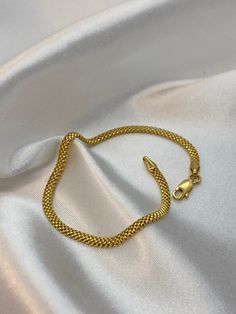 18k Gold Bismarck Bracelet ,3.16mm, 7.5", 3.310gr  18K solid gold bismark or Mesh chain bracelet is the best choice , because it is comfortable and flexible to use and easily adapts to every style.  Priced to sell! Compare our prices to other similar sellers! Arrives in a GIFT BOX and includes FREE SHIPPING within the USA and Canada. International shipping is available at the most economical rates on ETSY. I HAVE BEEN IN THE JEWELRY BUSINESS ALL MY LIFE. I am a second -generation family member m Yellow Gold Plated Snake Chain Bracelet, Yellow Gold Jubilee Bracelet With Snake Chain, Flexible Gold-plated Bracelet, Gold Flexible Snake Chain Bracelet, Gold Snake Chain Bracelet With Lobster Clasp, Gold Jubilee Bracelet With Snake Chain For Formal Occasions, Formal Gold Jubilee Bracelet With Snake Chain, Formal Gold Snake Chain Jubilee Bracelet, Gold Plated Flexible Chain Bracelet