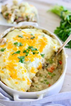 a casserole dish filled with mashed potatoes and meat