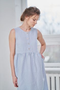 "MsWrinkle's clothing - from human to human. 100% handmade. *Description* - Sleeveless smock/maternity dress with pockets. Breastfeeding friendly ; - High quality European linen; - Washed and softened (doesn't shrink anymore); - Medium weight linen (150 g/m2); - Our linen is OEKO-TEX certified that meets human ecological safety requirements; - Model is wearing size S in sky blue, snow white, lemon yellow and elephant grey color (other sizes and colors please choose on the right) - Not transparen Bakery Uniform, Linen Maternity Dress, Linen Maternity, Summer Linen Pants, Capsule Dressing, Linen Slip Dress, Sleeveless Linen Dress, Strappy Midi Dress, Dress Linen