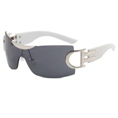 Elevate your style game with our Oversized Rimless Double D Armed Y2K Wholesale Sunglasses. These statement-making shades will make you stand out from the crowd, while providing maximum UV protection for your eyes. Guaranteed to bring compliments and protect your vision - the perfect combination! Trendy Rimless Shield Sunglasses With Uva Protection, Trendy White Rimless Sunglasses, White Rimless Shield Sunglasses For Summer, Trendy Rimless Polycarbonate Sunglasses, Trendy Outdoor Rimless Sunglasses, White Rimless Sunglasses For Summer, White Polycarbonate Shield Sunglasses For Summer, Rimless Shield Sunglasses With Tinted Lenses, Trendy Rimless Outdoor Sunglasses