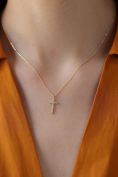 About this product This delicate 14K gold diamond cross necklace shines brightly around your neck, making it the perfect gift for your loved ones. It can be set in yellow, rose or white gold to best suit your style. D I A M O N D D E T A I L S Diamond Quality: * Diamond carat: 0.06 ct. * Cut: Perfect cut F E A T U R E S * Gold Setting: 14K * Gold Color Selection: Yellow Gold, Rose Gold, White Gold * Necklace Height: 13 mm / 0.51 inches * Necklace Width: 7 mm / 0.28 inches * Length Options: 14", Fine Jewelry Diamond Crucifix Necklace Gift, Fine Jewelry Crucifix Diamond Necklace As Gift, Yellow Gold Diamond Cross Necklace Gift, Diamond Cross Necklace In Yellow Gold As Gift, 14k Gold Cross Diamond Necklace For Gift, Gold Diamond Cross Necklace, Cross Necklace For Women, Diamond Cross Necklace Gold, Diamond Cross Necklace