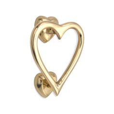 a gold heart shaped door handle on a white background