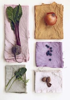 four napkins with vegetables on them are arranged in the shape of rectangles