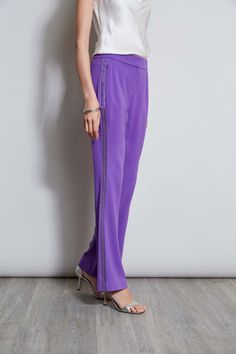 We chose our favorite Fluid Crepe for the season's must have pant. Incredibly flattering with a fit & flare leg - these pants are detailed with a partially lined lace insert down the sides for a glimpse of leg. Get ready for the compliments. Elie Tahari Exclusive Fit & Flare Fluid Crepe Pant with Lace Side Stripes 70% Triacetate, 30% Polyester Runs true to size. Model is 5'9" and wearing size 2 Measurements: 10"L front rise 33.5"L inseam (approx. length for a size 6) Dry Clean Only Imported Styl Flare Pant, Lace Side, Satin Cami, Elie Tahari, Lace Insert, Side Stripe, Flare Pants, Fit & Flare, Silk Satin