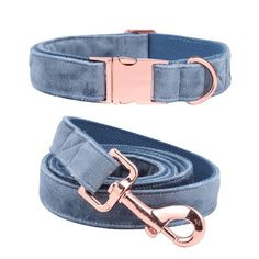 a blue velvet leash with rose gold buckles and a pink metal hook on the end