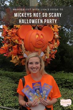 a woman wearing an orange mickey mouse hat and holding two children's halloween books