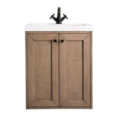 a bathroom vanity with two doors and a sink